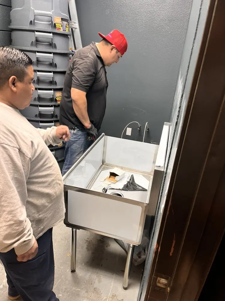 Commercial plumbing and sink installation in Frontenac